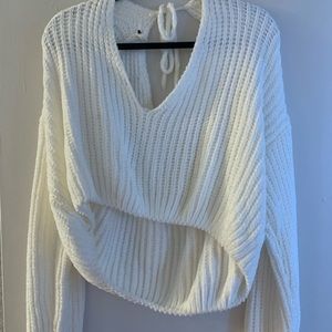 A white crop sweater